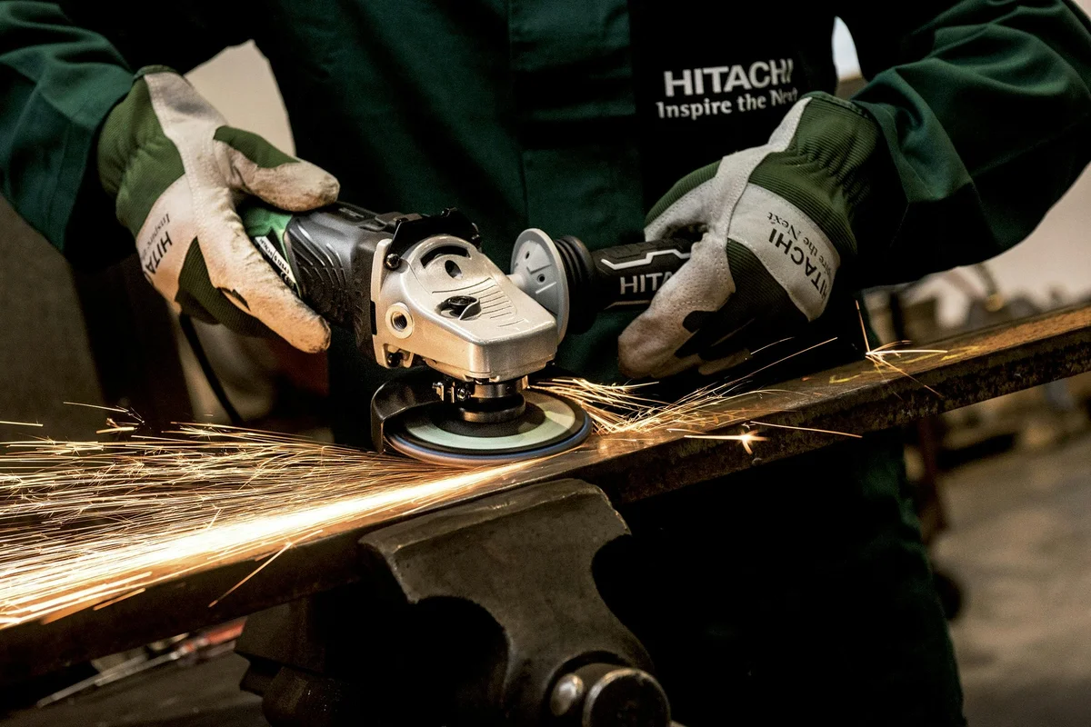 Professional metalworking with angle grinder and sparks
